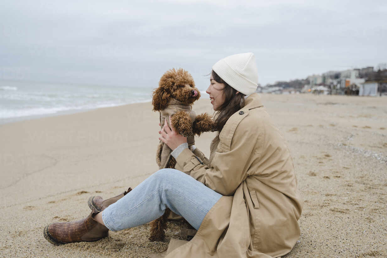 Enjoying With a Pet on a Beach